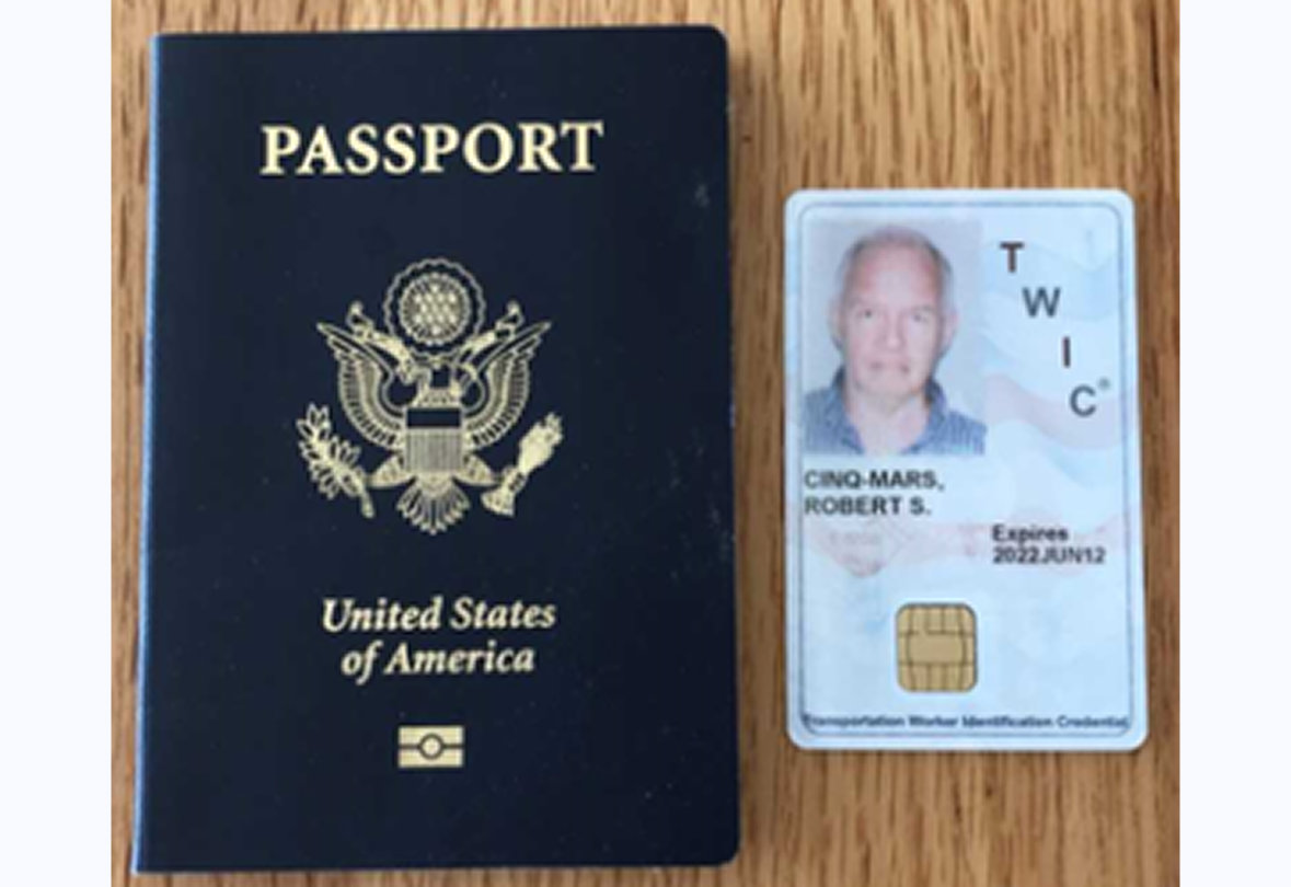 US passport beside identification card
